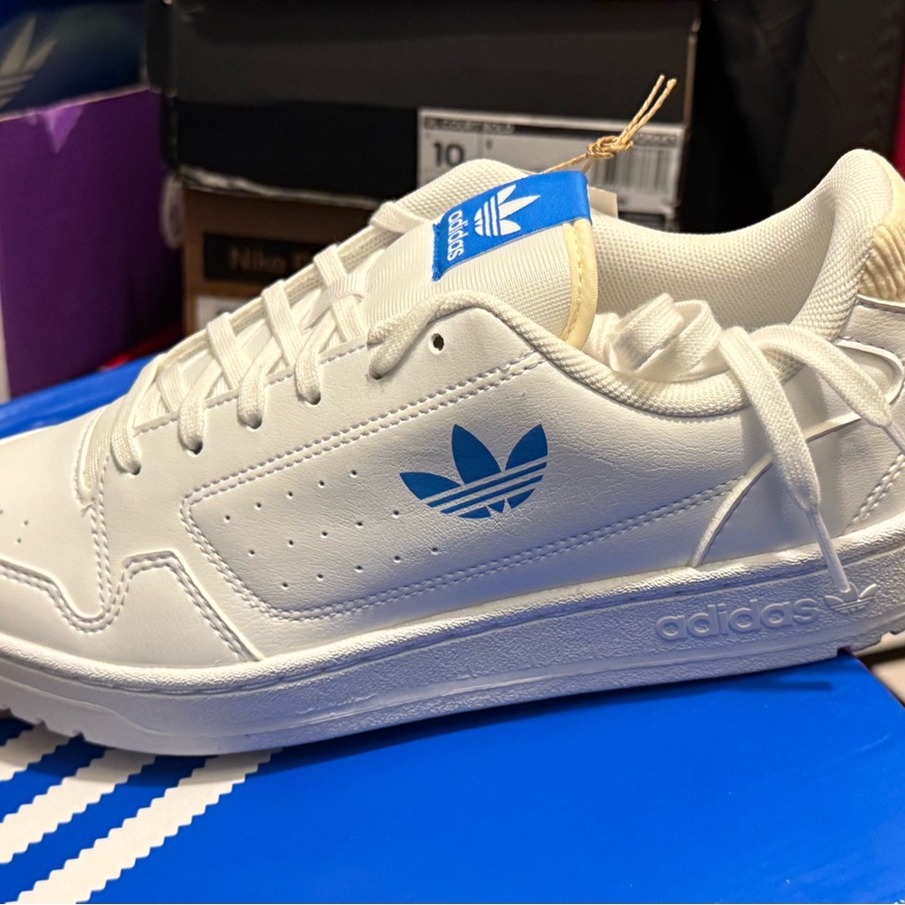 Adidas White Sneakers with Blue Logo